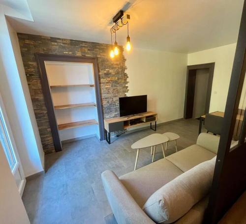 Appartement centre-ville Annecy tesisinde bir oturma alanı