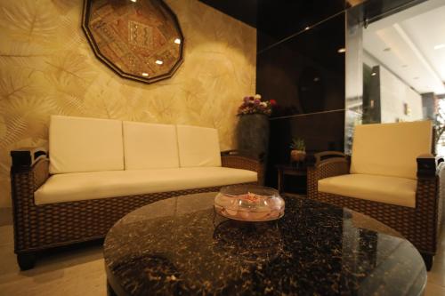 Zona de estar de Hotel KRC Palace
