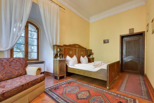 Postel nebo postele na pokoji v ubytování Palace Popowo Stare