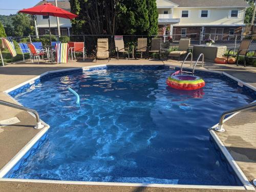 a swimming pool with a toy in the water at Riverboat Inn & Suites in Madison