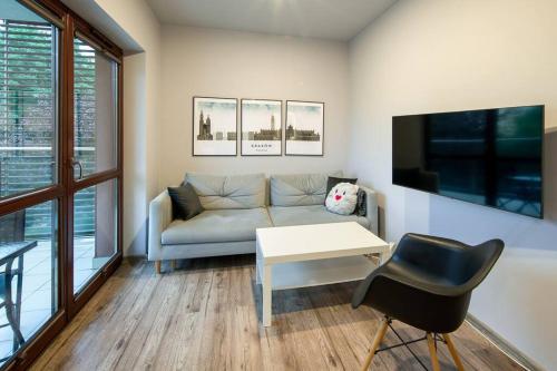 Area tempat duduk di Pretty, comfy and spacious apartment