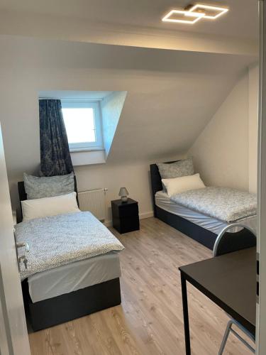 Ένα ή περισσότερα κρεβάτια σε δωμάτιο στο Apartment Delux mit 4 Schlafzimmer