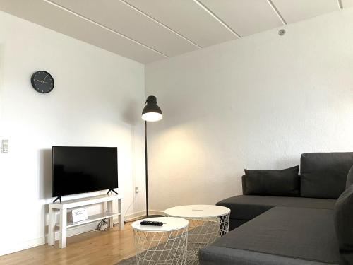 Et opholdsområde på Furnished 2 Bedroom Apartmet I Fredericia