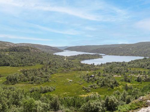 an aerial view of a lake and hills at Chalet Fjellkos by Interhome in Fossdal
