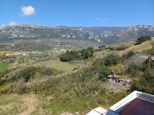 a view of a hill with mountains in the background at Villa Giulia - Cilento - Giungano in Giungano