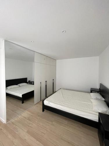 A bed or beds in a room at Fresh central apartment