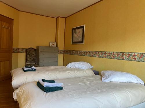 Katil atau katil-katil dalam bilik di Grand Triplex vue mer centre du village