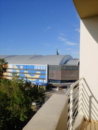 a train is on the tracks next to a building at Tulum in San Juan