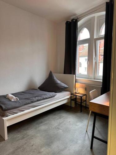 Postel nebo postele na pokoji v ubytování Congress Appartement /Stadtpark