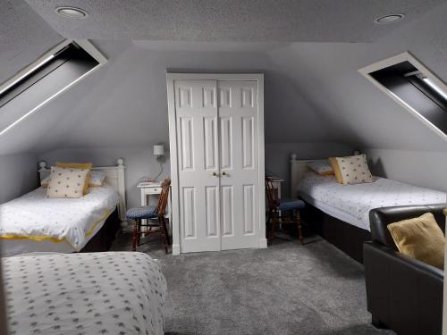 Un ou plusieurs lits dans un hébergement de l'établissement Langside Bed and Breakfast