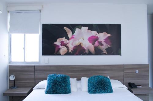 Postel nebo postele na pokoji v ubytování BGA Hotel