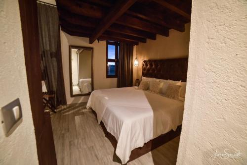 Suites Campestres Montebelloにあるベッド