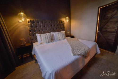 Suites Campestres Montebelloにあるベッド