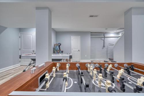 a gym with a bunch of exercise equipment at 8-Bedroom Luxury Home in Baltimore Maryland in Phoenix