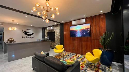 TV a/nebo společenská místnost v ubytování Hotel La Serena