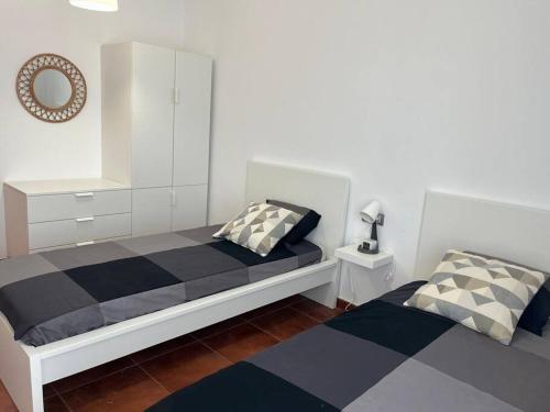 Кровать или кровати в номере EUCORRALEJO 1