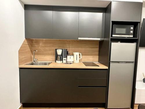 Cuisine ou kitchenette dans l'établissement Moschato New Home 3 vipgreece