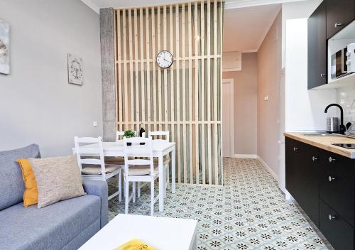 Η κουζίνα ή μικρή κουζίνα στο Apartamentos Manzanares 'Madrid Rio'