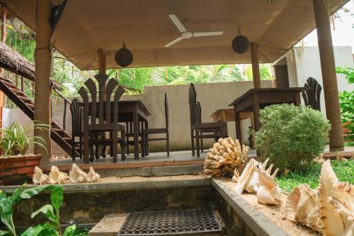 Jardín al aire libre en Rekawa Turtle Gate Hotel