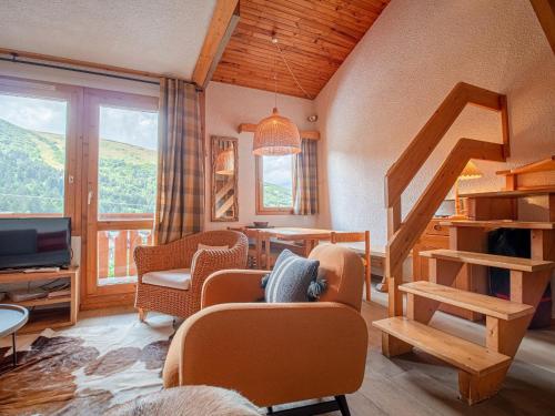 Appartement Valmorel, 3 pièces, 7 personnes - FR-1-356-281にあるシーティングエリア