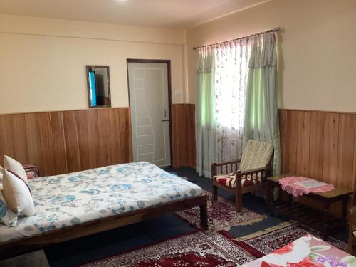 Ένα ή περισσότερα κρεβάτια σε δωμάτιο στο WARUHANG HOMESTAY