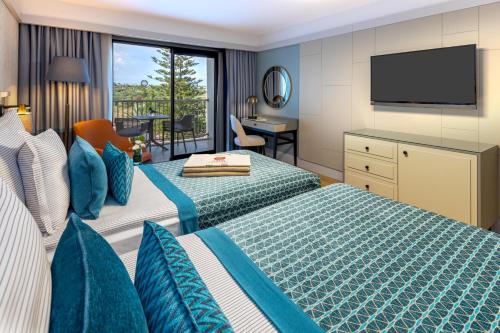 Postel nebo postele na pokoji v ubytování Arum Barut Collection - Ultra All Inclusive