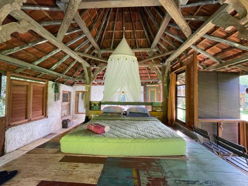 Letto o letti in una camera di Oemah Tepi Sawah