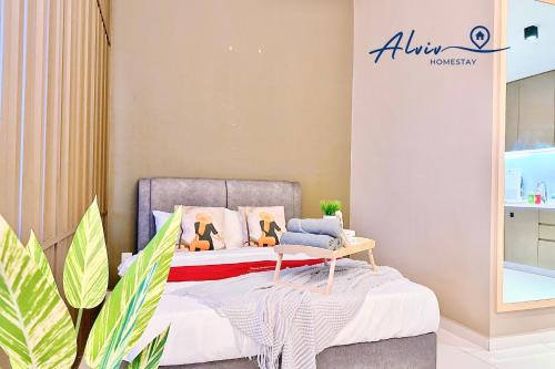 a bedroom with a bed in a room at Alviv 99 Suites I Family Suite I 4-7 pax I 5minsMelakaCruise I JonkerSt in Melaka