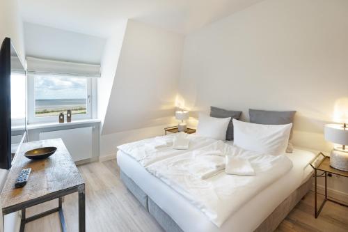 Postel nebo postele na pokoji v ubytování Schöne Aussicht