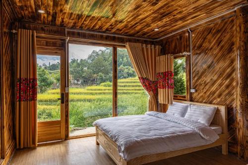 Giường trong phòng chung tại Hoa Chanh Bungalow