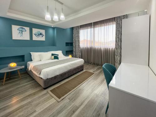 Postel nebo postele na pokoji v ubytování O'Beach Boutique Studios
