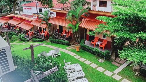 an aerial view of a building with chairs and a yard at Cliff View Bungalows in Ko Chang
