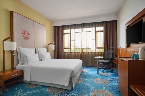 Кровать или кровати в номере Paradox Singapore Merchant Court at Clarke Quay