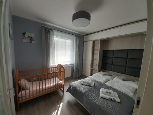 Cama o camas de una habitación en B2B Apartments