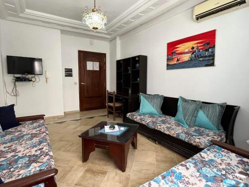 Телевизор и/или развлекательный центр в Palmeraies vacances Tunis