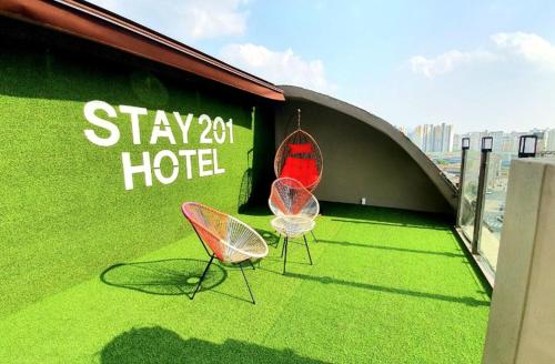 two chairs sitting on top of a roof at STAY201 in Jecheon