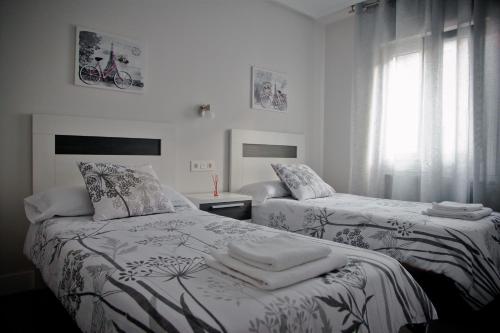 Ένα ή περισσότερα κρεβάτια σε δωμάτιο στο Zubia Home PORTUGALETE - Al lado metro BILBAO - EBI01527