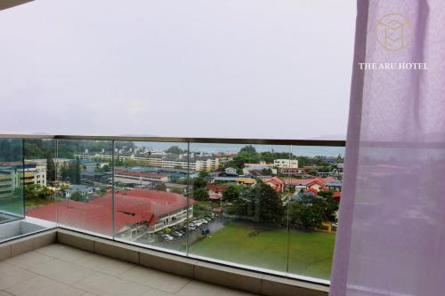 a view of a city from the top of a building at The Aru Hotel at Aru Suites in Kota Kinabalu