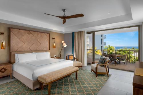 Una cama o camas en una habitación de Conrad Punta de Mita