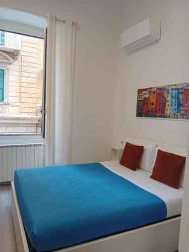 Postel nebo postele na pokoji v ubytování Titi Rooms