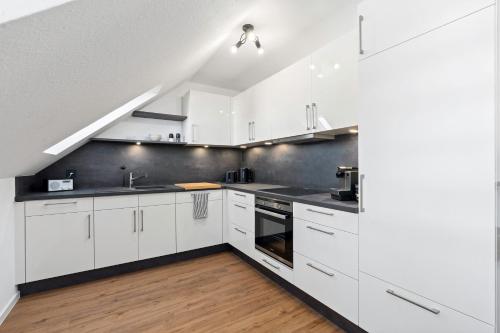 Η κουζίνα ή μικρή κουζίνα στο Apartment Lio - See und Zentrum