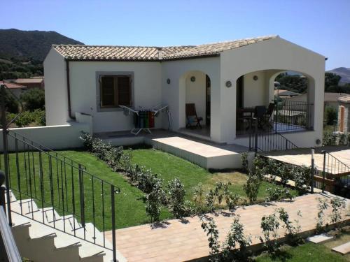 a villa with a view of a house at Villa Vigna in Badesi