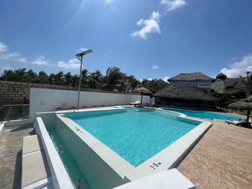 Der Swimmingpool an oder in der Nähe von Mawe Zuri Resort