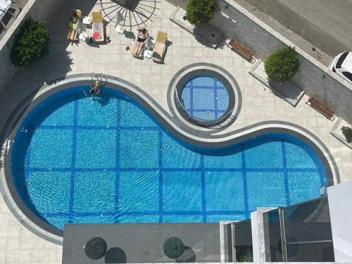 Výhled na bazén z ubytování Seda Tower Алания 1+1 море 300 метров nebo okolí