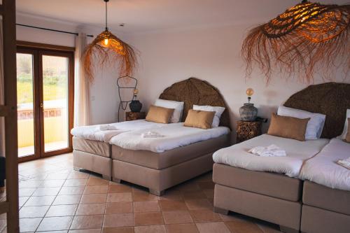 Ένα ή περισσότερα κρεβάτια σε δωμάτιο στο Boutique Hotel Serena Vista