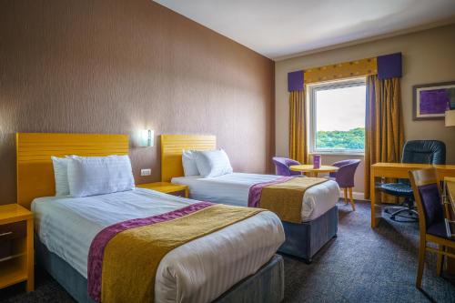 Letto o letti in una camera di City Hotel