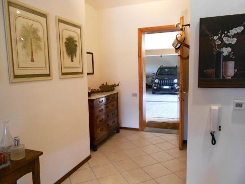 a hallway with a room with a car parked in a garage at La Collina D'Oro in Cernobbio