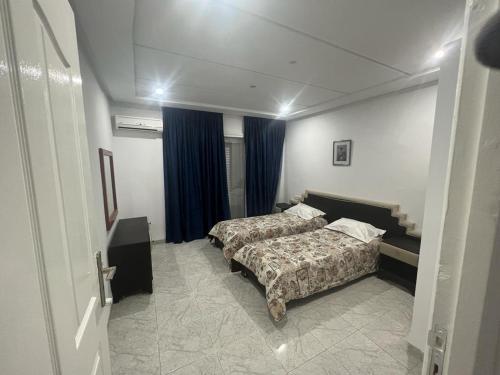 Cama o camas de una habitación en Residence ElFaracha