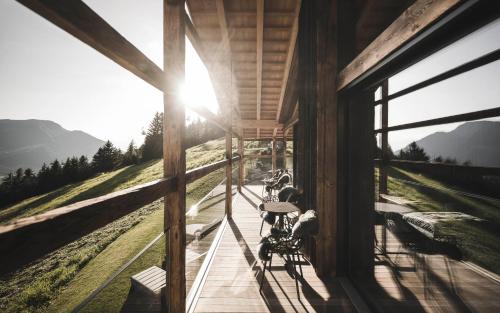 a group of motorcycles parked inside of a building at Luxury Chalet Vilaiet in Ortisei