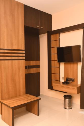 TV a/nebo společenská místnost v ubytování Heritage Suites